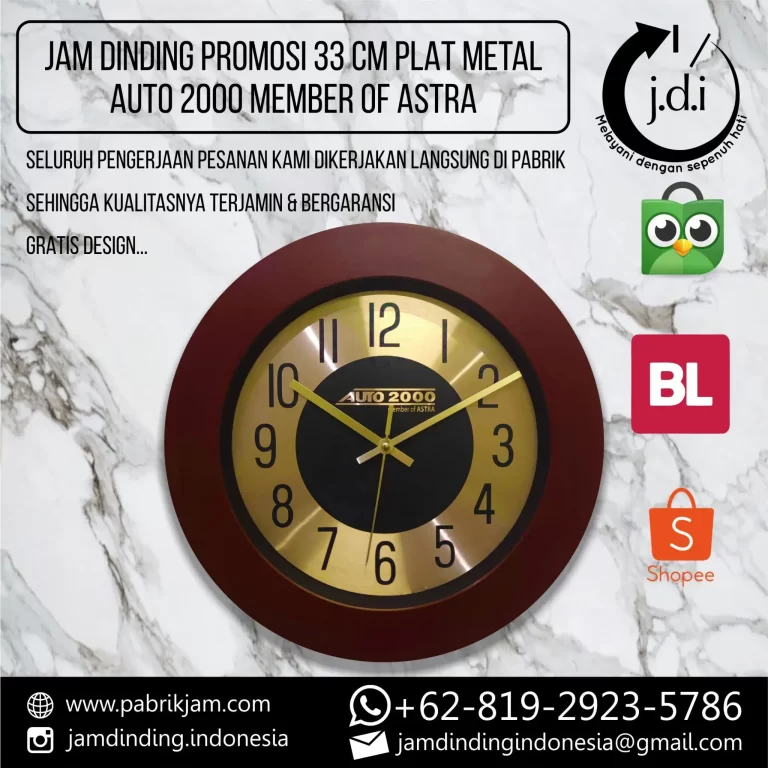 Jam dinding Auto 2000 custom diameter 33 cm dengan plat metal emas dan logo.