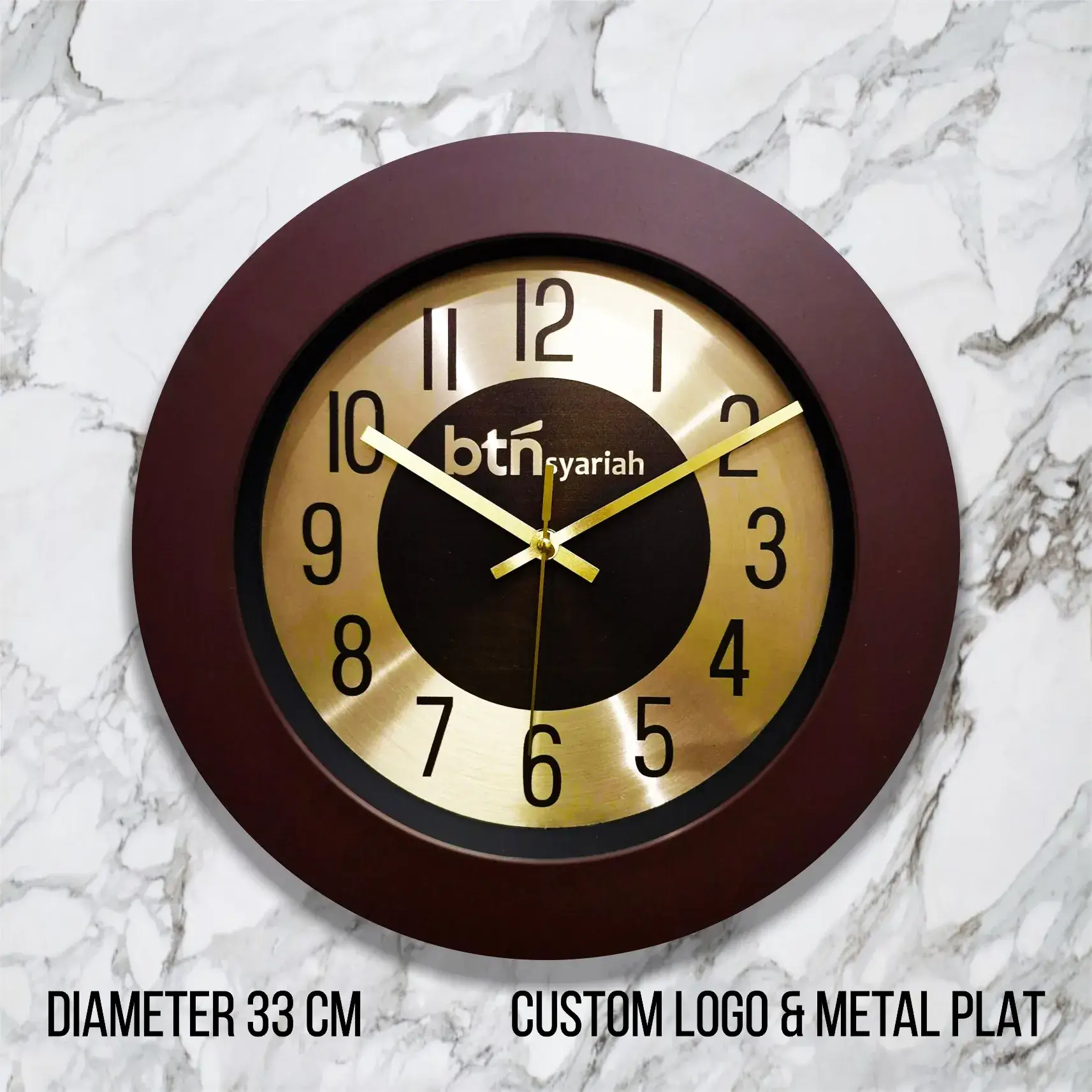 Souvenir jam BTN Syariah custom logo metal 33cm dengan desain elegan dan minimalis, cocok untuk branding dan promosi bisnis. Pesan sekarang di https://pabrikjam.com