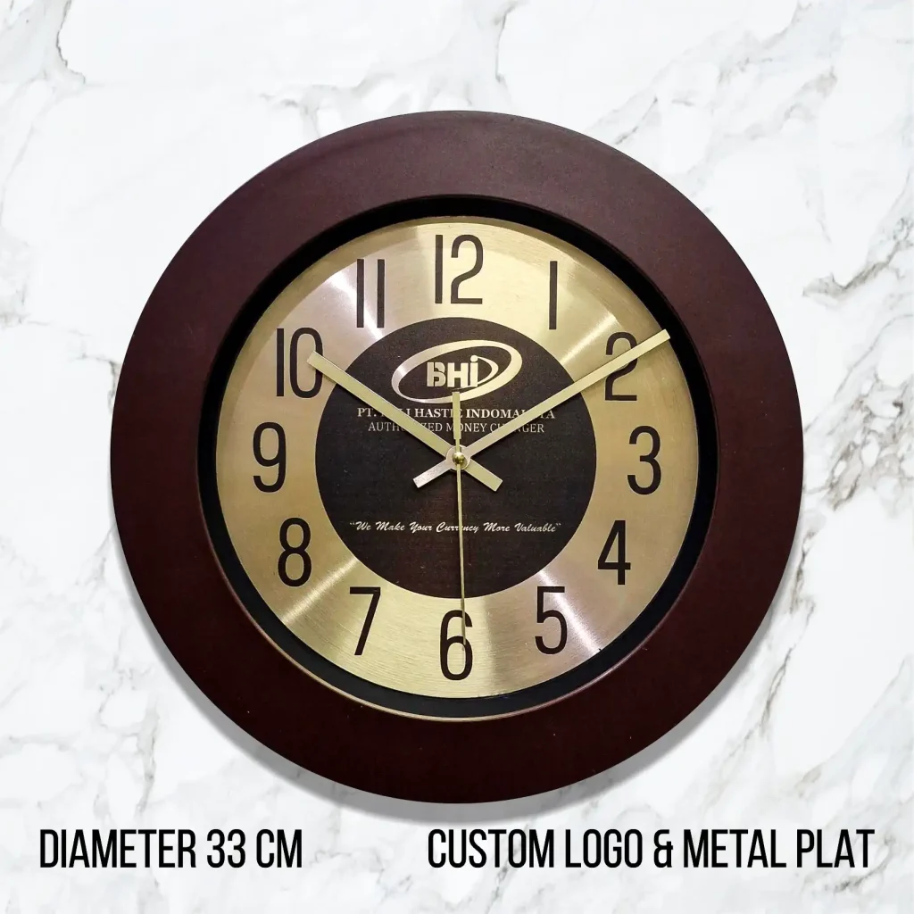 Identitas visual BHI Money Changer diperkuat oleh jam BHI 33cm custom - hadiah korporat eksklusif dari https://pabrikjam.com