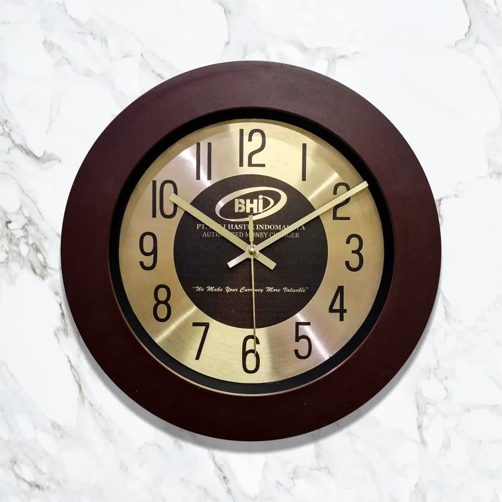 Souvenir jam BHI custom 33cm - strategi branding BHI Money Changer Bali pakai jam dinding logo dari https://pabrikjam.com